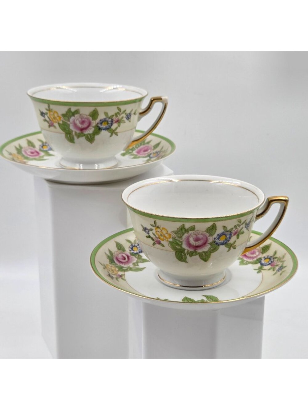 Celebrate Set of 2 Footed Cup and Saucer Set Green & Cream Band Floral Sprays